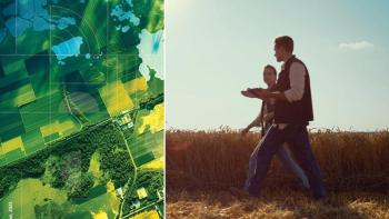 two men walking in the brown field