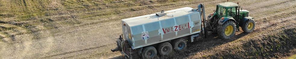 a camion distributiog fertilisers on a field