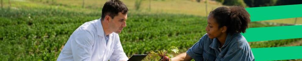 two young persons doscussing in a field